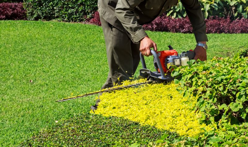 Landscaper Using Shears
